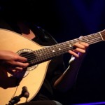 "fado"-playing a tradicional portuguese guitar
